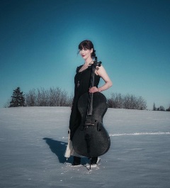 Christine Hanson posing with a cello