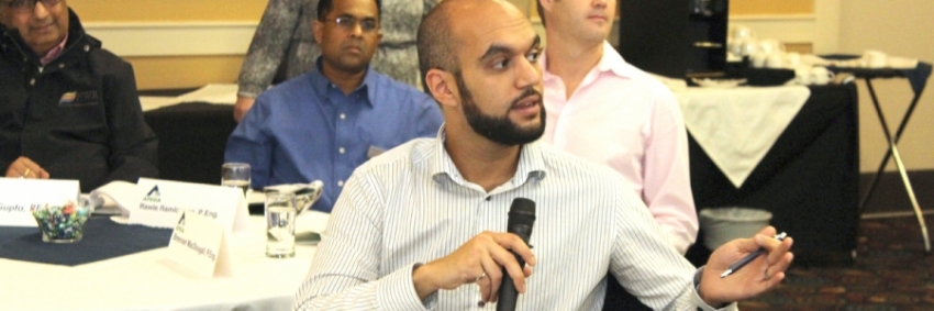 ASET's proposed changes to scope of practice A man holding a microphone and speaking while gesturing