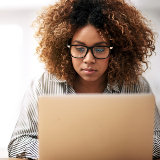 Woman in front of a laptop