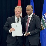 Jay Nagendran receiving the King Charles III Coronation Medal